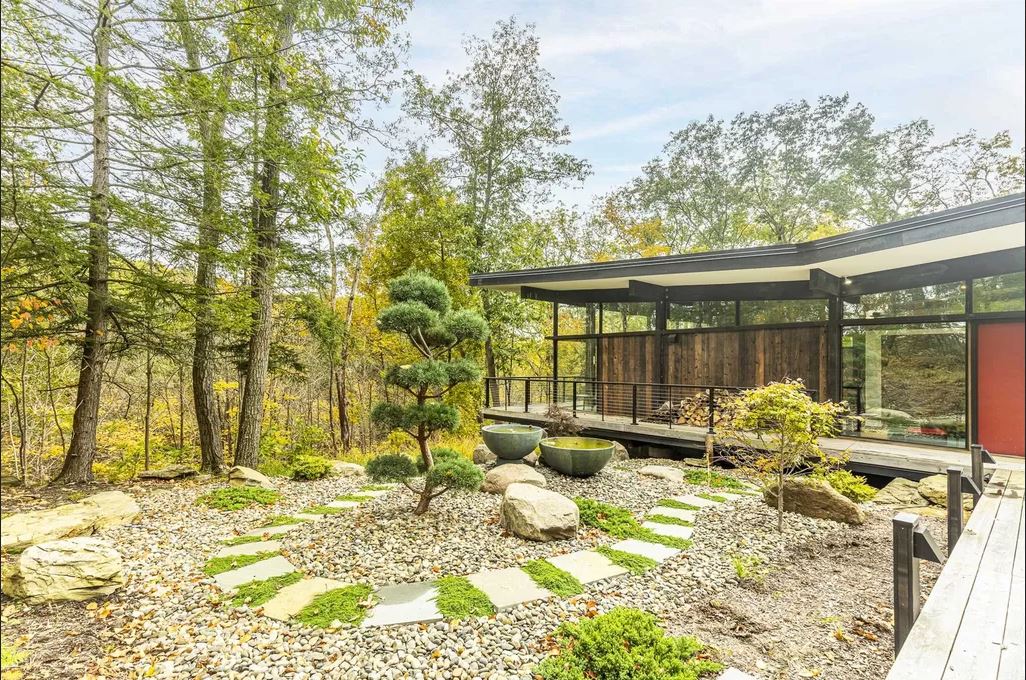 Modesthouse mid-century modern home with a Japanese garden